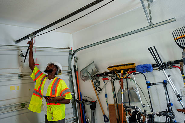 Professional Garage Door Spring Repair technician working in West Cape May, NJ